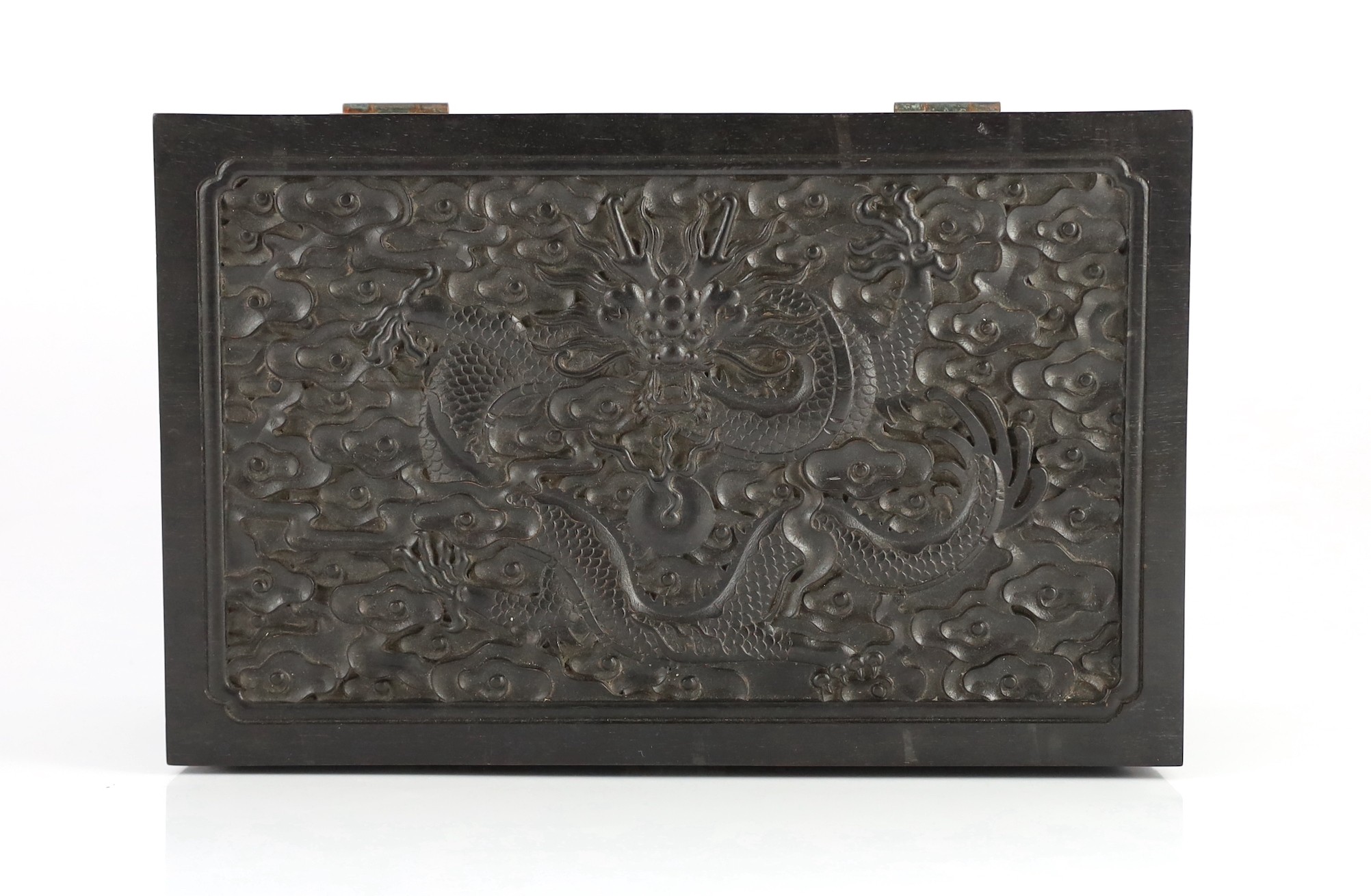 A Chinese hardwood 'dragon' box, possibly zitan, late 19th/early 20th century, 34cm wide